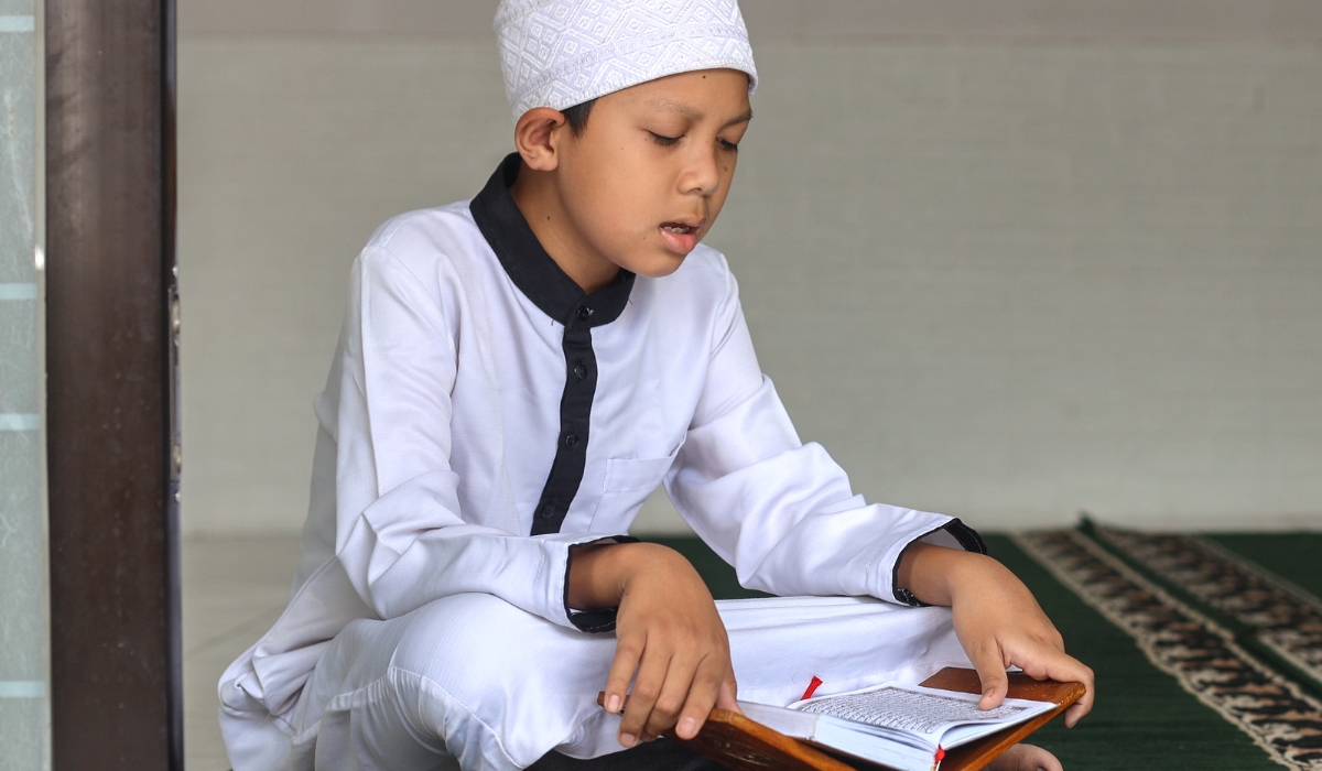 60 kids compete in a Holy Quran memorization contest